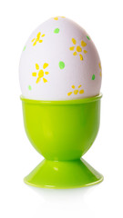 Painted egg in a stand