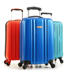 Travel suitcases isolated on white background