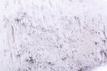 Macro mineral stone pumice stone on white background