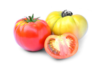 Fresh red and yellow tomato isolated on white background