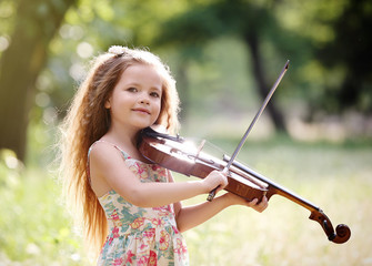 Beautiful girl playing violin