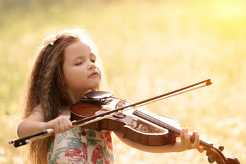 Beautiful girl playing violin