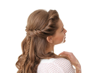 Young beautiful woman with nice braid hairstyle on white background