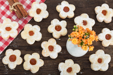 Puff pastry cookies filled with strawberry jam