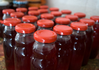 Juices made of natural grown raspberries with red blind plugs