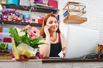 young girl working in a flower shop