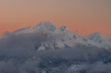 Fototapeta na wymiar Winter Tatra mountains, Hawran, Muran and Placzliwa Skala in High Tatra mountain range