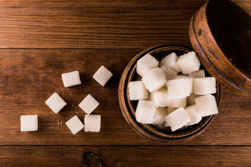 Diabetes. A lot of sugar cubes in jar