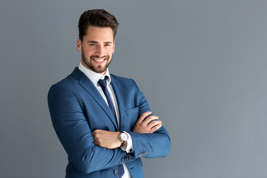 Male Model In A Suit Posing Indoors Stock Photo, Picture and Royalty Free  Image. Image 75752720.