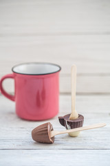 Cup of chocolate on a stick