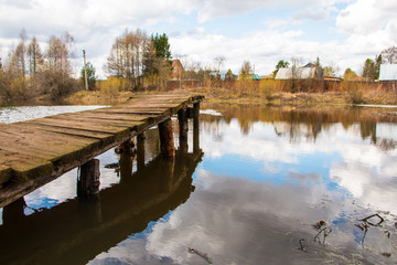 Lake and old bridge in a spring