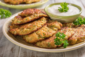 Vegetable fritters with potato, carrot, zucchini served with Ranch sauce.