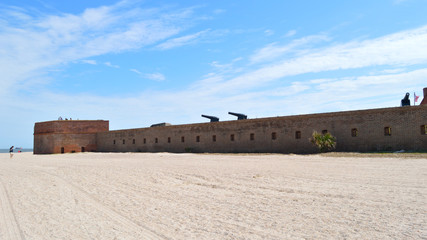Historical brick fort on sunny beach