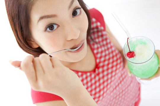Young woman enjoying an ice cream float