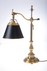 Fototapeta na wymiar Table lamp, white table lamp, red, black, reading lamp with lampshade, golden incandescent lamp, vintage, orange, wooden, metal table lamp, orange lamp, lamp