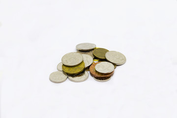 coins Czech crowns folded and scattered on a white background