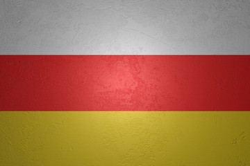 Flag of Ossetia on stone background, 3d illustration