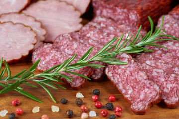 Set of cold cuts on a wooden board