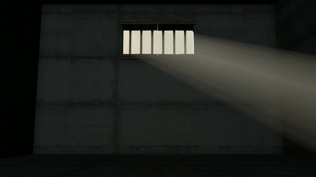 A  24 hour time-lapse from inside an empty dark jail cell with light rays penetrating the barred window