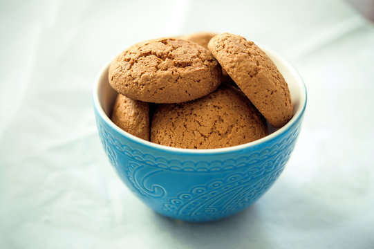 Oatmeal cookies in a blue bowl
