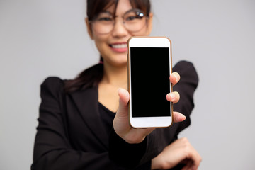 Asian women show blank screen of cellphone