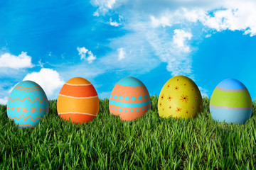 Easter eggs in green grass. Happy Easter.