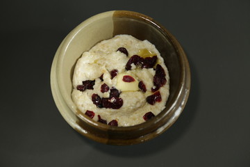 Top view oat porridge cran berries