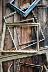 Wooden frames on a wooden wall