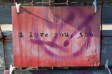 Painted wood panel "I Love You Too."