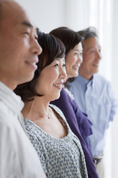 Four People Smiling