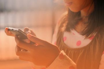 young girl with her smartphone