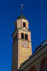 Fototapeta na wymiar Sappada Church clock tower