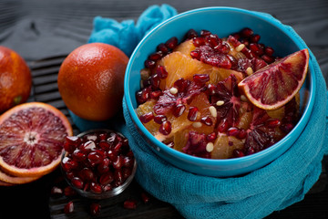 Fruit salad with blood sicilian oranges and pomegranate, studio shot