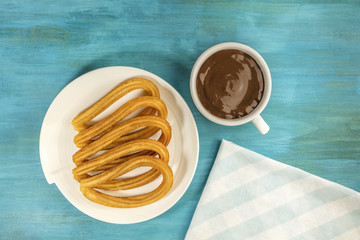 Traditional Spanish churros dessert with copyspace