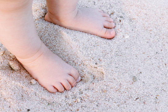 baby feet in the sand