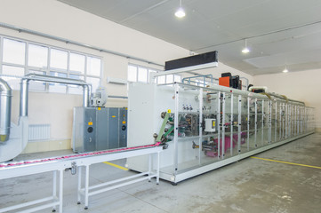 factory and equipment for the production of female sanitary napkins
