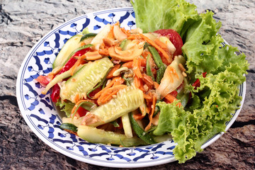 Spicy and sour mixed vegetable salad with cucumber.