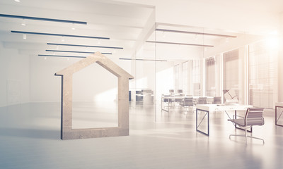 Conceptual background image of concrete home sign in modern offi