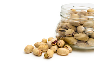 Bank of pistachios on a white