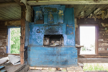 Ruined brick oven in an old abandoned house in a Russian village