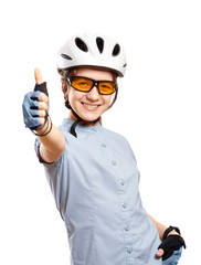Young girl in a bicycle helmet shows gesture OK,  isolated on white.