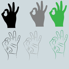 Fototapeta premium The black and other color hand with sign Ok.