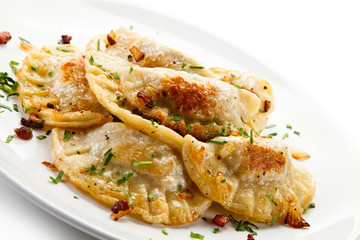 Dumplings on white table