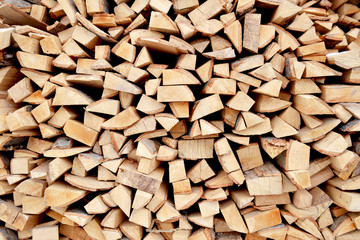 woodpile with firewood. photo on the theme of wood texture background, material design