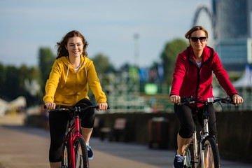 Women biking in the city