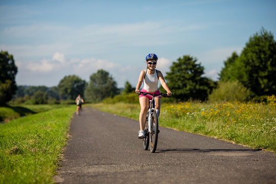 Young woman cycling outdoor