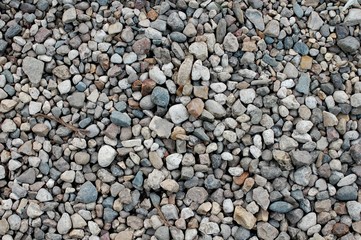 Background texture of grey pebble stones
