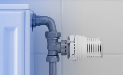 Temperature knob of heating radiator, used and dusty