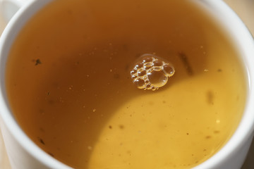 macro photo of pured puerh tea in cup, shallow focus
