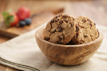 classic chocolate chip cookies in bowl, shallow focus